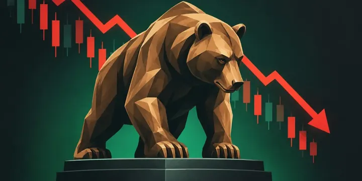 Bronze bear statue with a descending red chart behind it